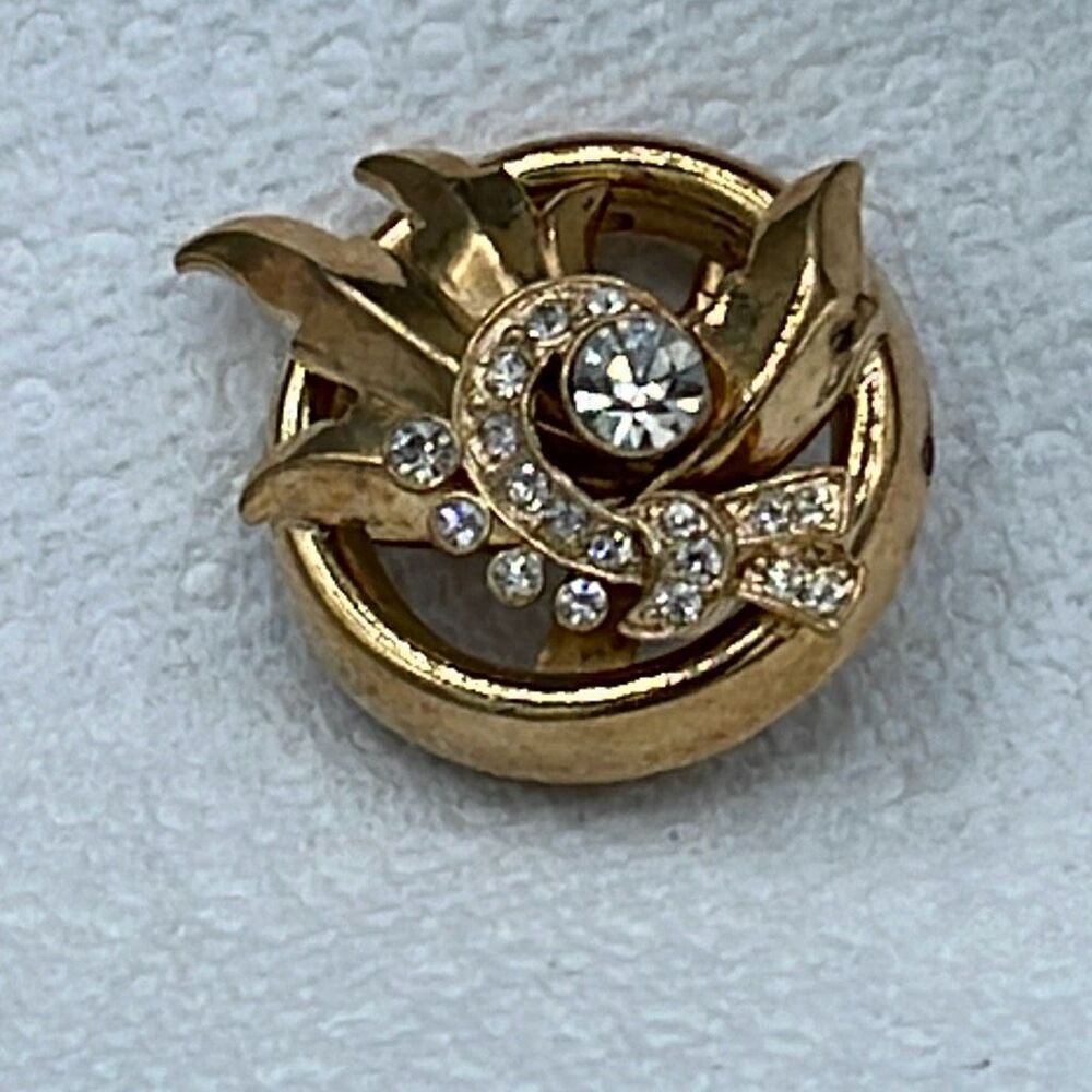 Vintage layered rhinestone brooch.